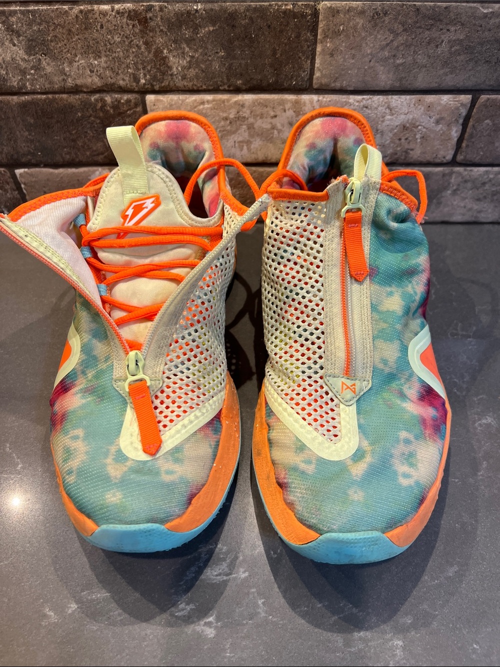 Nike men’s basketball shoes in Teal & Orange